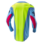 Alpinestars Techstar Ocuri Jersey 2024, koszulka motocrossowa, jasnoniebieska, żółta fluo i czerwona, widok z tyłu z jaskrawym neonowym żółtym panelem pleców, jasnoniebieskie rękawy z czerwonymi akcentami, ergonomiczny sportowy krój.