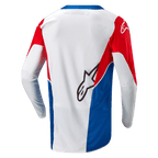 Alpinestars Honda Racer Iconic, koszulka motocross off-road, biała, niebieska i czerwona, widok z tyłu przedstawiający wydłużony dół i lekką konstrukcję odprowadzającą wilgoć