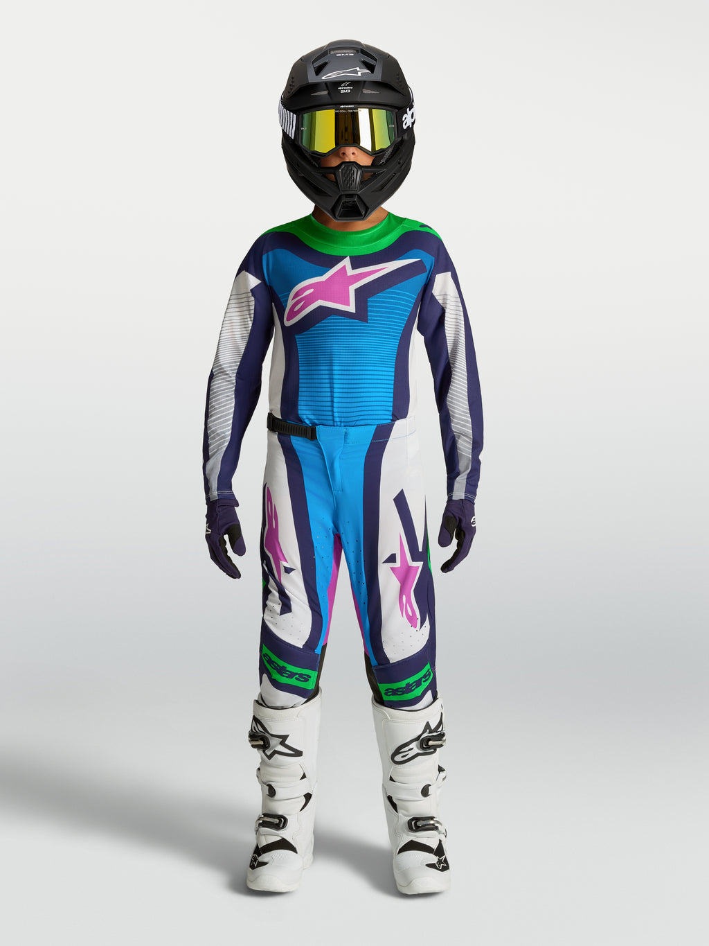 Alpinestars Youth Supertech Maven Gear Set, blue and white motocross outfit with green and pink accents, on-model.