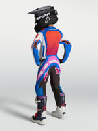 Alpinestars 2027 Youth Supertech Maven Jersey and Gear Set, Blue and Hot Coral motocross outfit, rear view on young rider.