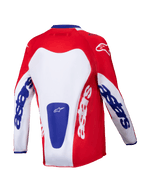Alpinestars Youth Racer Veil Jersey 2025, koszulka motocrossowa, jasnoczerwona i biała z niebieskimi akcentami, widok z tyłu z wyraźnym logo „astars” na rękawach i plecach, zaprojektowana dla młodzieży do jazdy terenowej