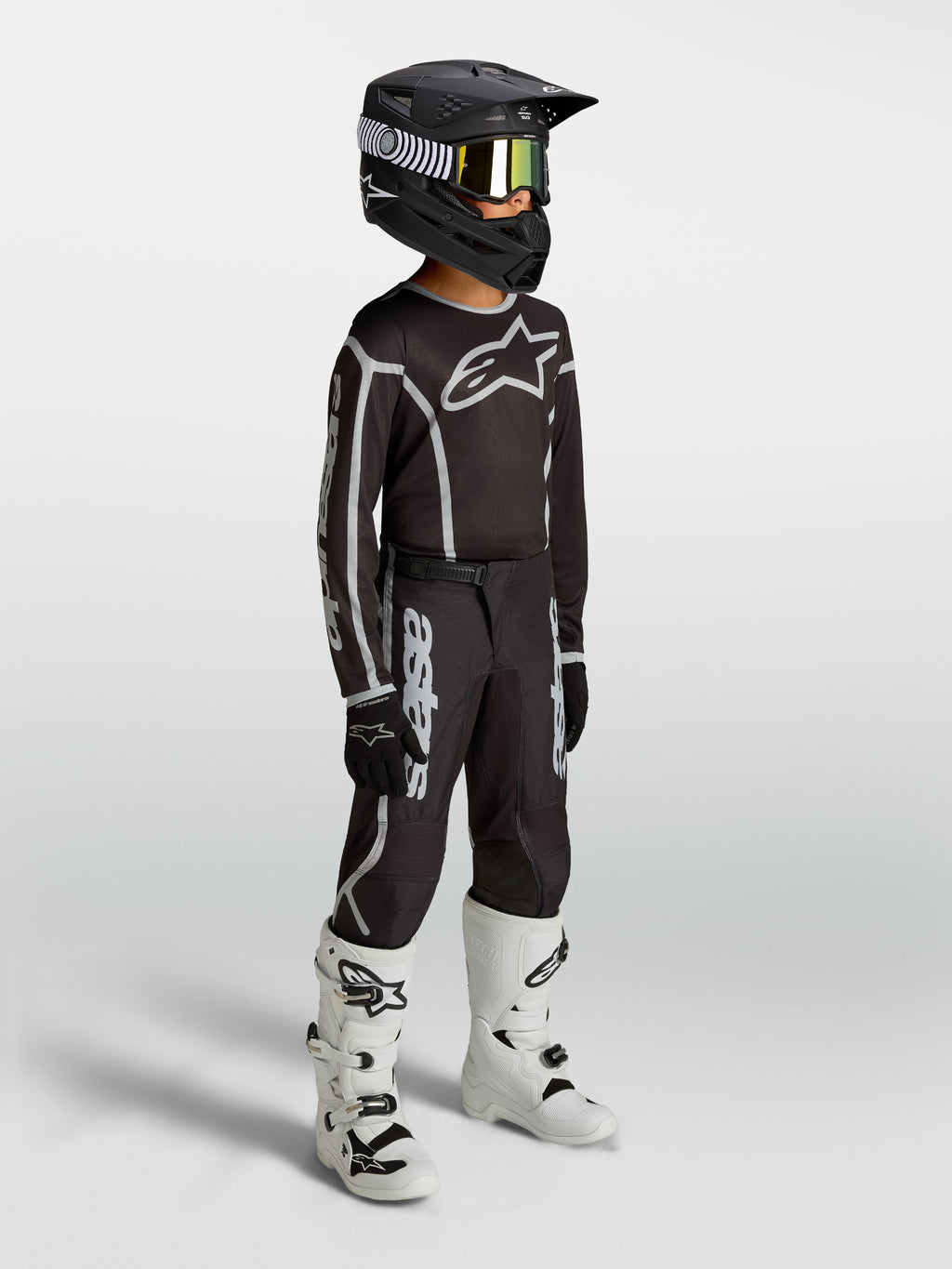 Alpinestars Youth Fluid Apex V2 Jersey and Gear Set, youth motocross outfit, black and silver, breathable textile.
