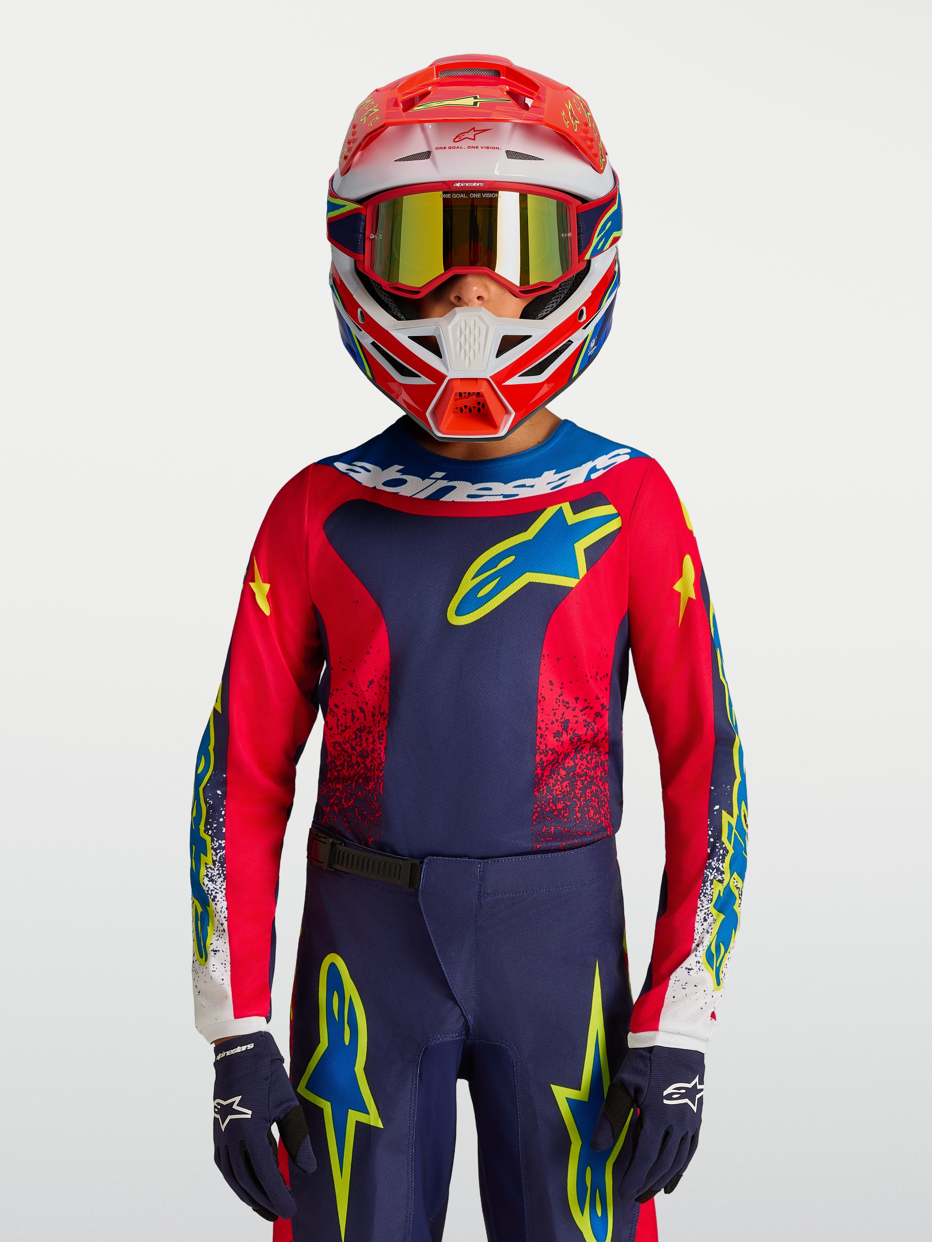 Koszulka Fluid Drag Młodzieżowe 2027 Alpinestars, koszulka motocrossowa, granatowa i czerwona z żółtymi akcentami, sportowy krój na modelu, odzież off-road