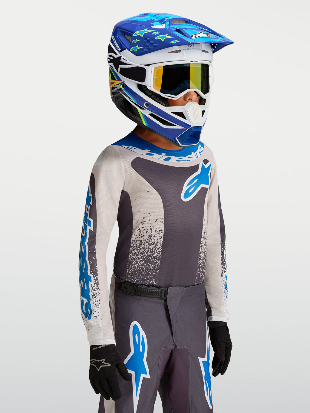 Alpinestars Youth Fluid Drag Jersey, młodzieżowa koszulka motocrossowa, szara i niebieska, lekki materiał techniczny.