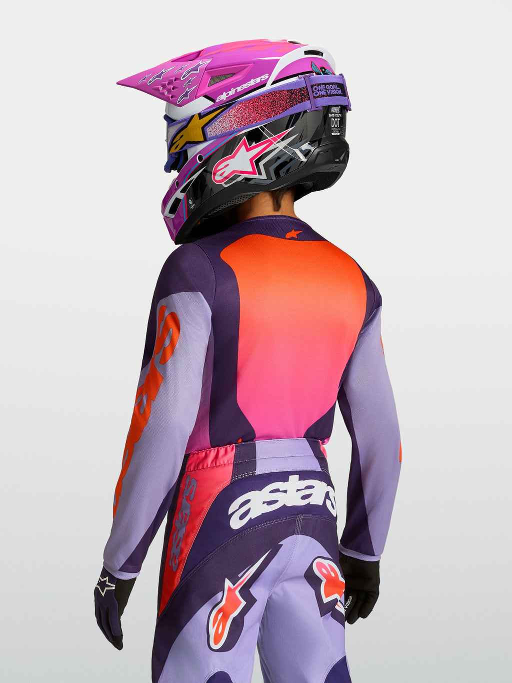 Alpinestars Koszulka Fluid Hunt Młodzieżowe 2027, fioletowa i różowa koszulka motocrossowa, lekki materiał, widok od tyłu.