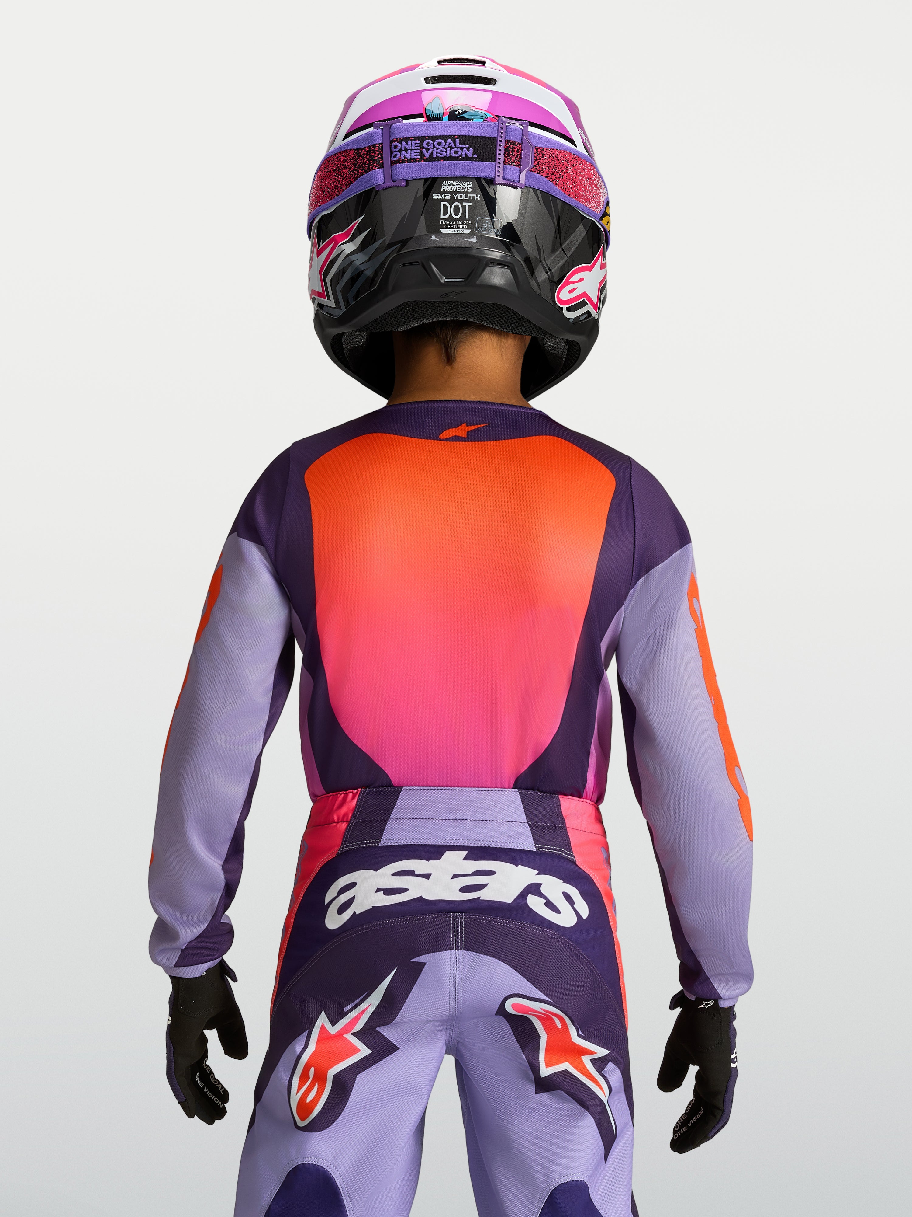 Alpinestars koszulka Fluid Hunt młodzieżowa, fioletowo-różowa koszulka motocrossowa, ergonomiczny krój, widok z tyłu.