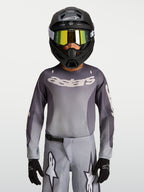 Alpinestars koszulka Fluid Amber młodzieżowe, szara i piaskowa oddychająca koszulka motocrossowa do jazdy terenowej.