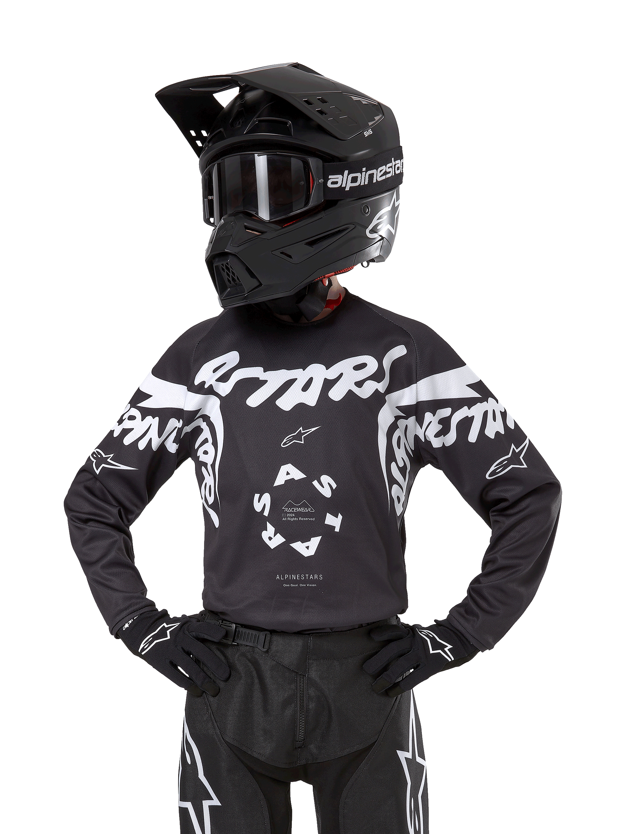 Alpinestars Youth 2024 Racer Hana Jersey, młodzieżowa koszulka motocrossowa, czarna z białymi grafikami "Astars" i "Alpinestars", centralny logotyp, model w czarnym kasku, goglach i rękawicach