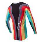 Alpinestars Stella Techstar Jersey 2024 damska, koszulka motocrossowa, czarna wielokolorowa, widok z tyłu z żywym, falistym wzorem w kolorach czerwonym, żółtym i turkusowym, białe logo Astar w dolnej części pleców, branding Alpinestars na rękawach.