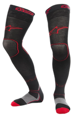Alpinestars MX Long Tech Thick Socks, Motocross Riding Socks, Black and Red, mid-thigh length with red branding, grey and red sole details, technical fabric designed for off-road racing and dirt bike boots