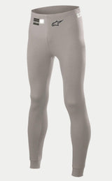 Alpinestars Race V2 Bottom FIA, samochodowa bielizna techniczna, szara, z czarnym logo gwiazdy na nogawce i etykietą homologacji FIA na pasie, lekka ognioodporna tkanina ze ściągaczami przy kostkach.