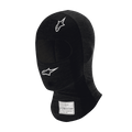 Alpinestars Race V3 Balaclava, czarna ognioodporna kominiarka wyścigowa, białe logo z gwiazdą na czole i policzku, etykieta z certyfikatem FIA na szyi, lekka tkanina techniczna z otworem na oczy, ochrona głowy w sportach motorowych