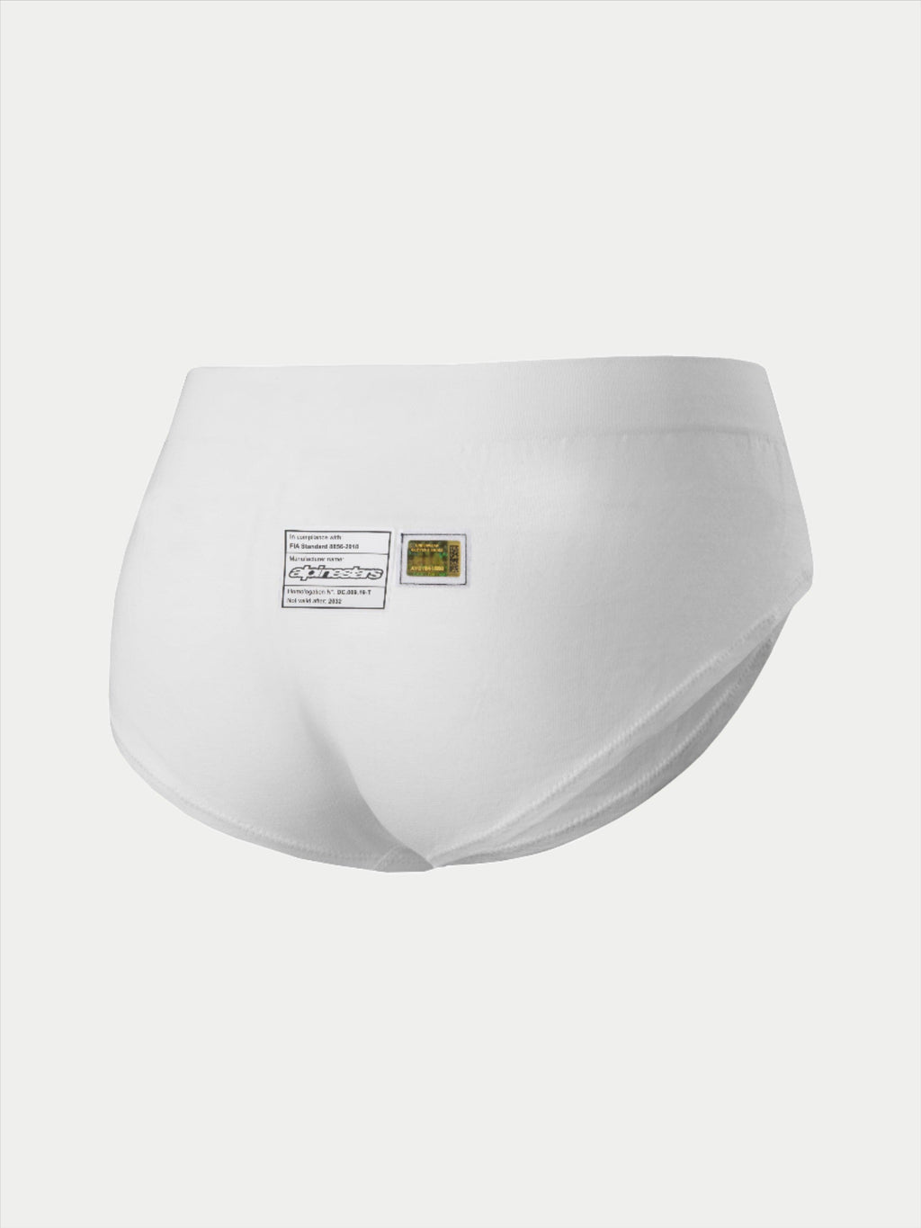 Alpinestars Stella TECH ZX Briefs, damska bielizna wyścigowa, białe, widok z tyłu z etykietami certyfikacyjnymi FIA 8856-2018 i brandingiem Alpinestars, lekka i ognioodporna warstwa bazowa do sportów motorowych