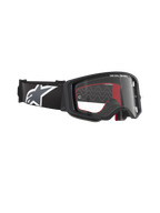 Alpinestars Supertech Corp Goggles, Motocross Goggles, Black frame with Clear lens, adjustable black strap with large white Alpinestars star logo, red foam interior accents, professional eye protection for off-road racing