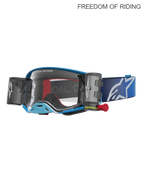 Alpinestars Supertech Firma, gogle motocyklowe do motocrossu i off-roadu, niebieskie i srebrne, wyposażone w zintegrowany system roll-off zapewniający wyraźną widoczność, soczewka z poliwęglanu o wysokiej przejrzystości, szeroki niebieski pasek z białym logo.