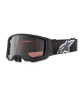 Alpinestars Supertech Corp Goggles Absolute Vision, Motocross Goggles, Black and Grey with Mirror Silver Lens, featuring an angular frame, adjustable black strap with a prominent white star logo, and multi-layer face foam for off-road performance.