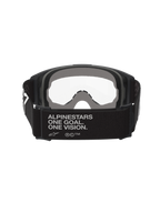 Alpinestars Vision Goggles OTG, gogle motocrossowe, czarno-szare, widok z tyłu ukazujący szeroki, czarny, tkany pasek z hasłem marki, wielowarstwowa szara pianka, przezroczysta soczewka, konstrukcja przystosowana do noszenia na okulary korekcyjne