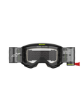 Gogle Alpinestars Vision 5 Hollow Roll Off, gogle motocrossowe, grafitowe i fluorescencyjne żółte, wyposażone w przezroczysty system roll-off z półprzezroczystymi zasobnikami, czerwony uchwyt, białe oznaczenia marki oraz napis „ONE GOAL. ONE VISION.”, zaprojektowane do wyścigów terenowych