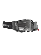 Alpinestars Vision 8 Amber Roll Off, gogle motocrossowe, czarne i srebrne, z systemem roll-off i przezroczystą soczewką.
