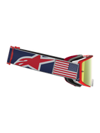 Alpinestars Supertech Fiftyfold, gogle motocrossowe, niebiesko-czerwone, czerwona lustrzana soczewka i naszywka z flagą USA.