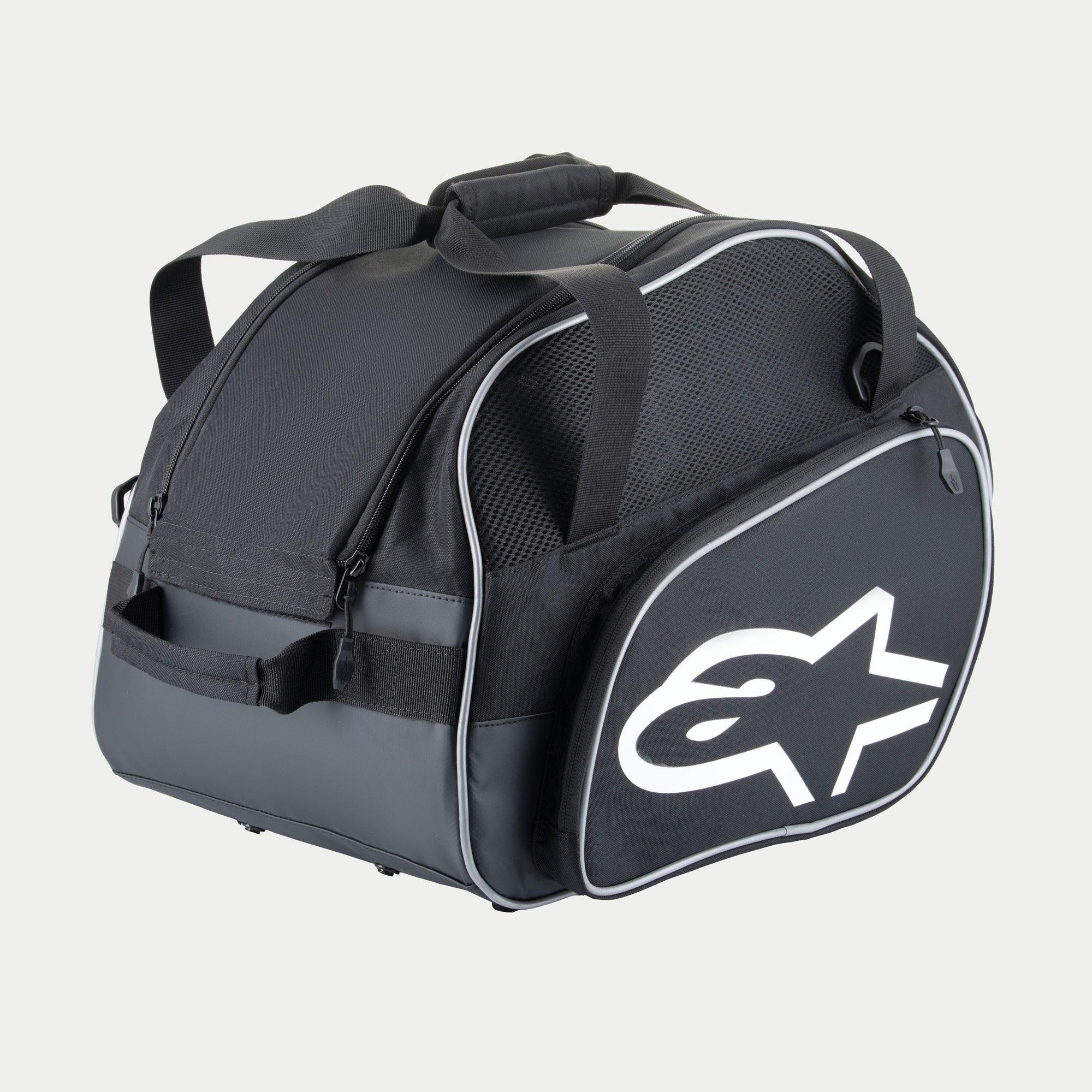 Alpinestars Flow V3 Helmet Bag, torba na kask pełnotwarzowy, czarno-biała, duże białe logo z boku, siatkowe panele wentylacyjne i wzmocnione uchwyty, wytrzymała poliestrowa konstrukcja na sprzęt wyścigowy