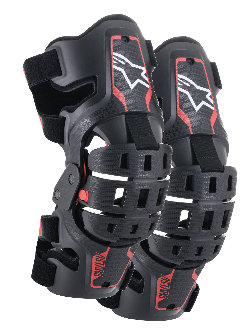 Alpinestars Youth Bionic 5S Knee Braces, ochraniacze kolan do motocrossu, czarno-czerwone, para ochraniaczy o hybrydowej konstrukcji ramy z wentylowanymi skorupami, białe logo Astar w górnej części, czerwony napis ASTARS w dolnej części oraz regulowane czarne paski zapewniające stabilne dopasowanie.