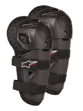Alpinestars Bionic Action Kickstart Knee Guards, młodzieżowe ochraniacze kolan i goleni do motocrossu, czarne z czerwonym logo KICKSTART, przegubowa plastikowa skorupa i podwójne elastyczne paski, sprzęt ochronny dla młodych zawodników off-road