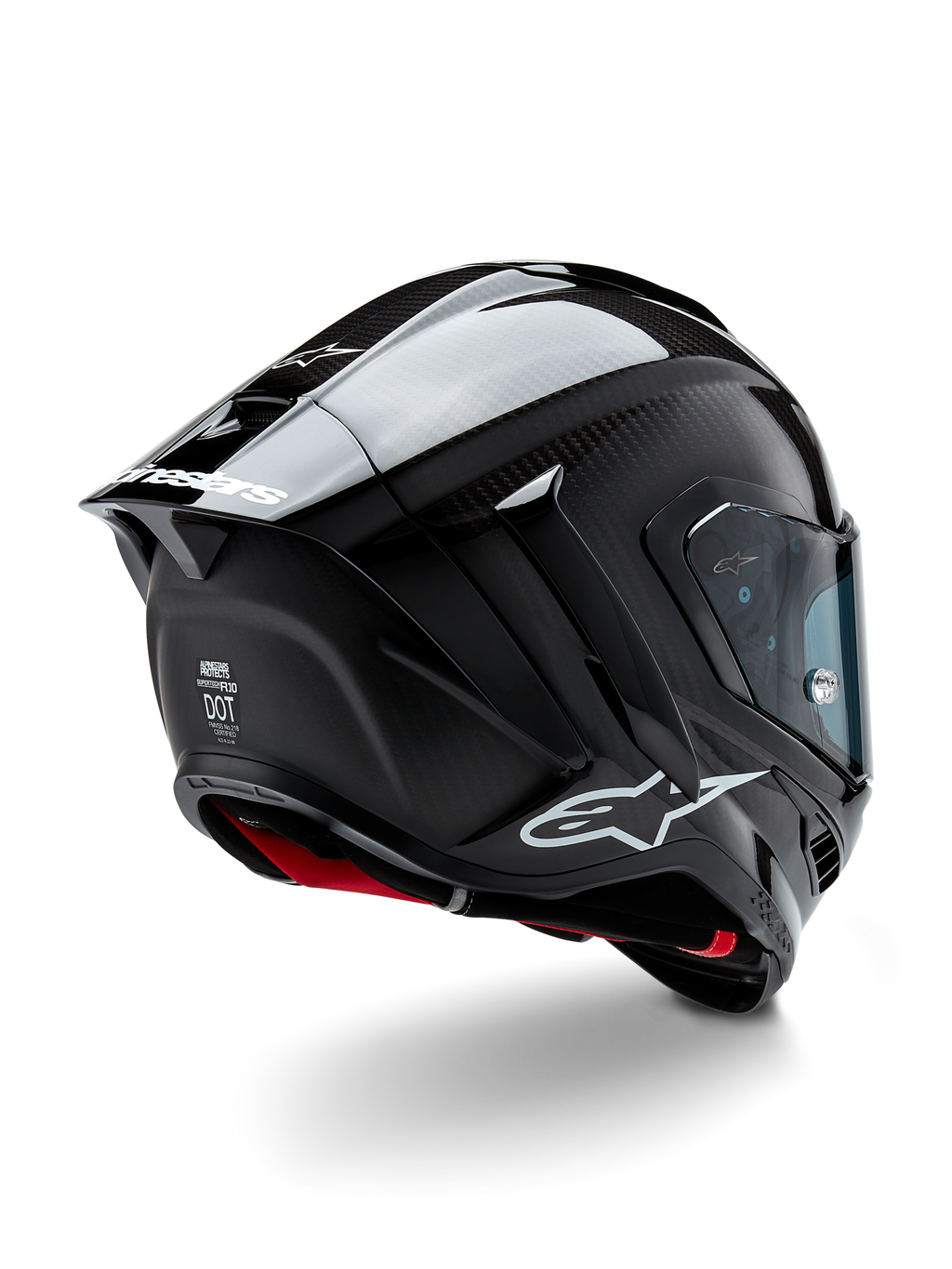 Kask Alpinestars Supertech R10 Solid, wyścigowy kask motocyklowy, czarne wykończenie z włókna węglowego (mat i połysk), widok z tyłu pod kątem trzech czwartych ukazujący karbonową skorupę, aerodynamiczny spojler oraz logo Alpinestars.