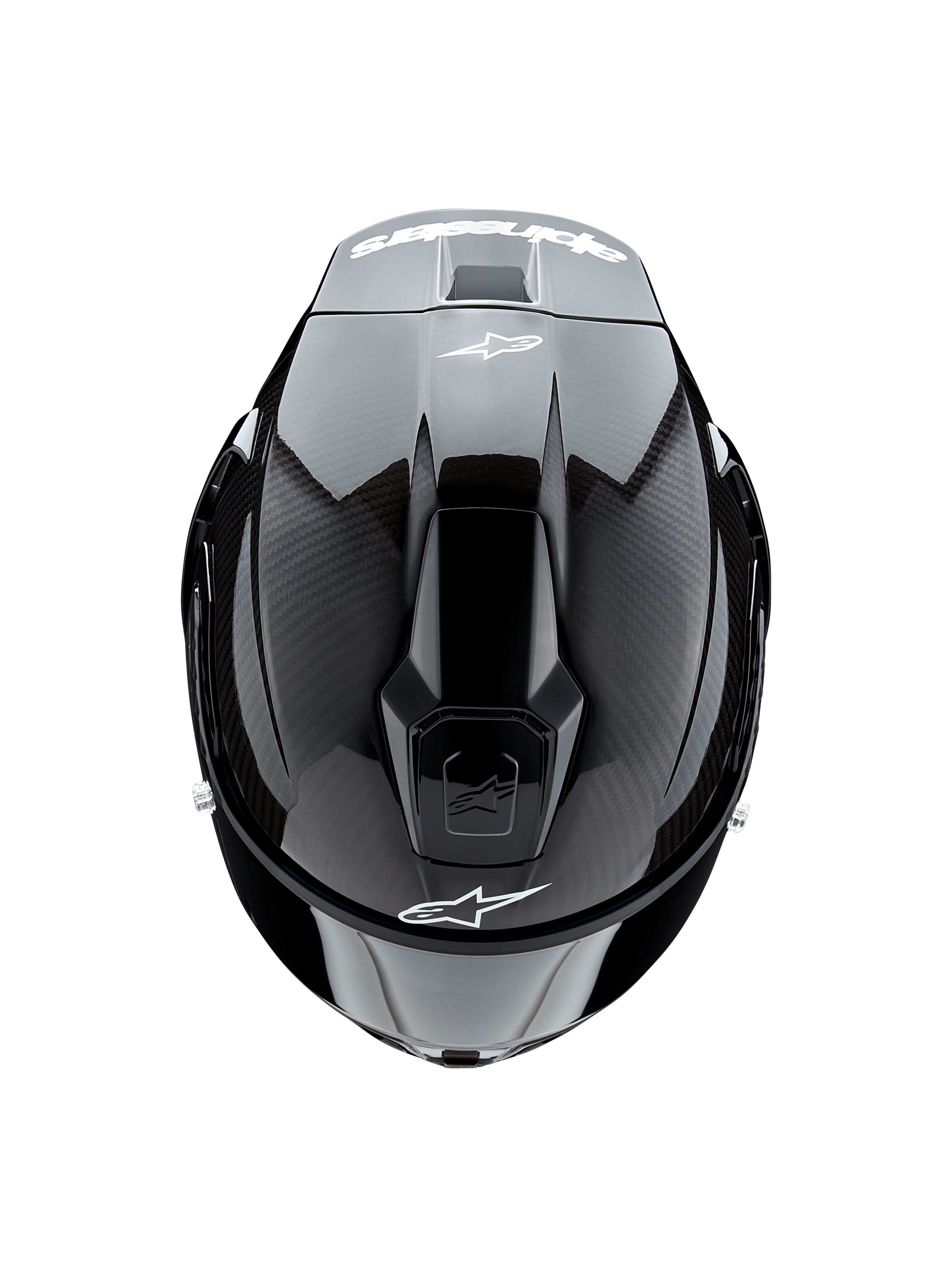Kask Alpinestars Supertech R10 Solid, widok z góry, czarny karbon matowy i błyszczący, widoczna tekstura włókna węglowego po bokach, błyszcząca sekcja środkowa, aerodynamiczne otwory wentylacyjne oraz białe logo Alpinestars z przodu i z tyłu