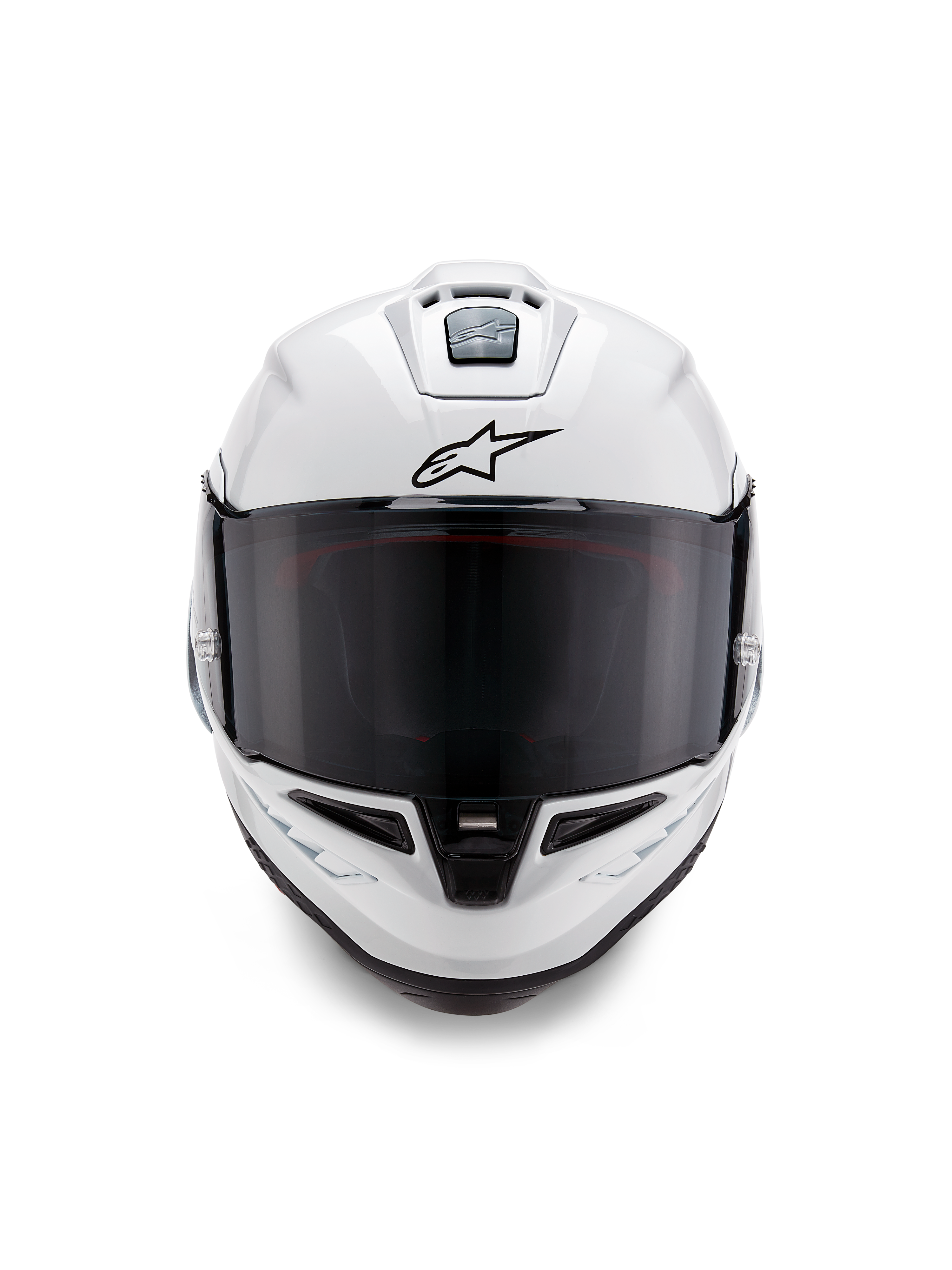 Alpinestars Supertech R10 Solid Helmet, wyścigowy kask typu full-face, biały błyszczący z czarnymi detalami, widok z przodu pokazujący ciemny wizjer, aerodynamiczny system wentylacji i czarne logo Astars