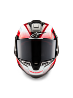 Kask Alpinestars Supertech R10 Team, widok z przodu, czarny karbon, czerwony i biały połysk, z ciemnym dymionym wizjerem, białe logo Astar na czole, czerwone napisy Alpinestars na szczęce, aerodynamiczna konstrukcja wyścigowa z misterną grafiką