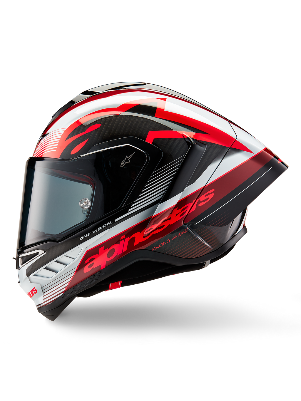 Kask Alpinestars Supertech R10 Team, pełny kask motocyklowy wyścigowy, błyszczące wykończenie w kolorach czarnego karbonu, czerwieni i bieli, profil boczny ukazujący aerodynamiczny design, wyraziste czerwone napisy „One Vision” i „Racing Ahead”, konstrukcja z włókna węglowego