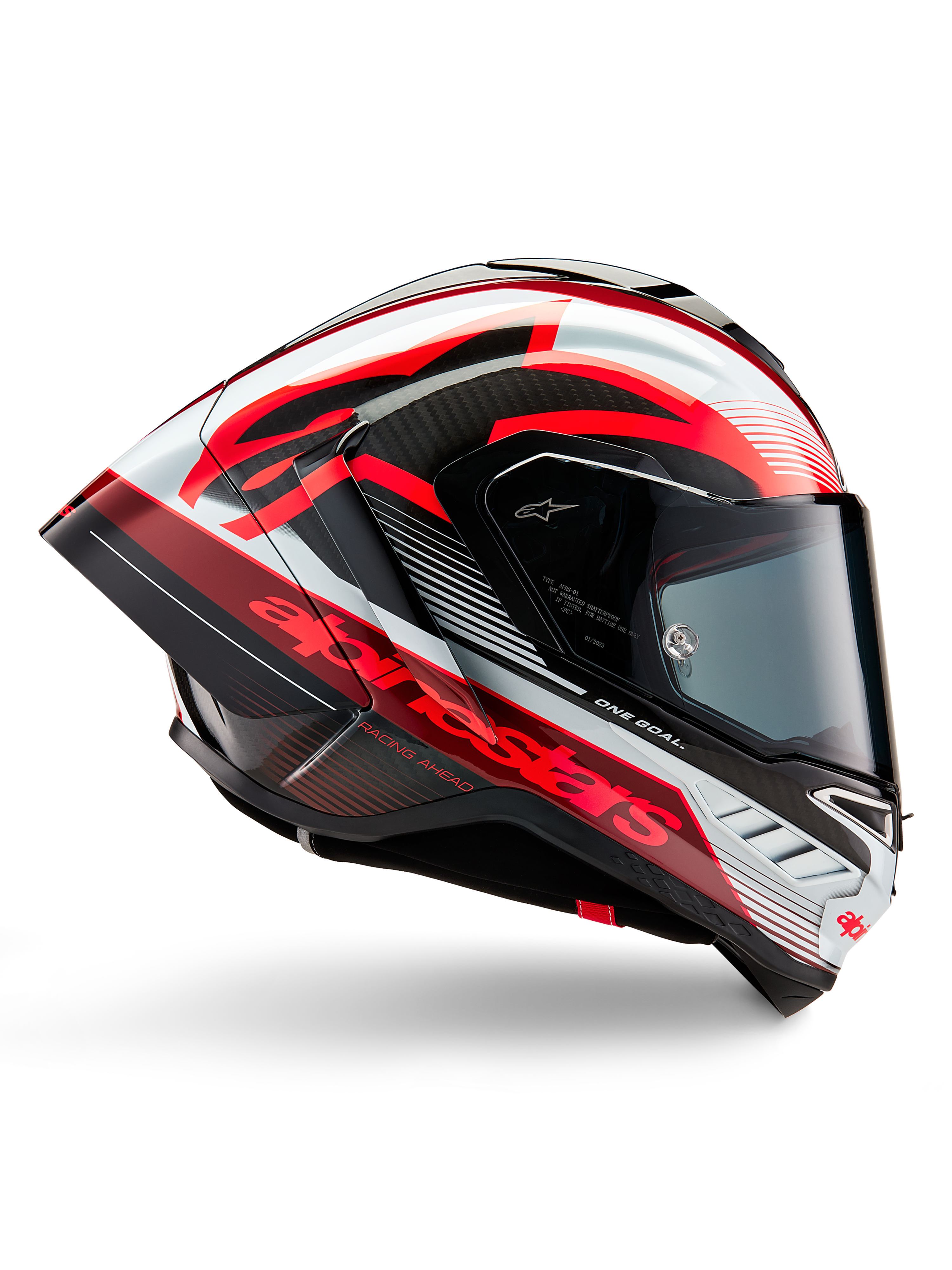 Kask Alpinestars Supertech R10 Team, wyścigowy kask motocyklowy, czarny karbon z czerwono-białą błyszczącą grafiką, aerodynamiczny widok z profilu z ciemnym wizjerem, detale z włókna węglowego i wyraziste czerwone logo, wysokiej klasy sprzęt wyścigowy