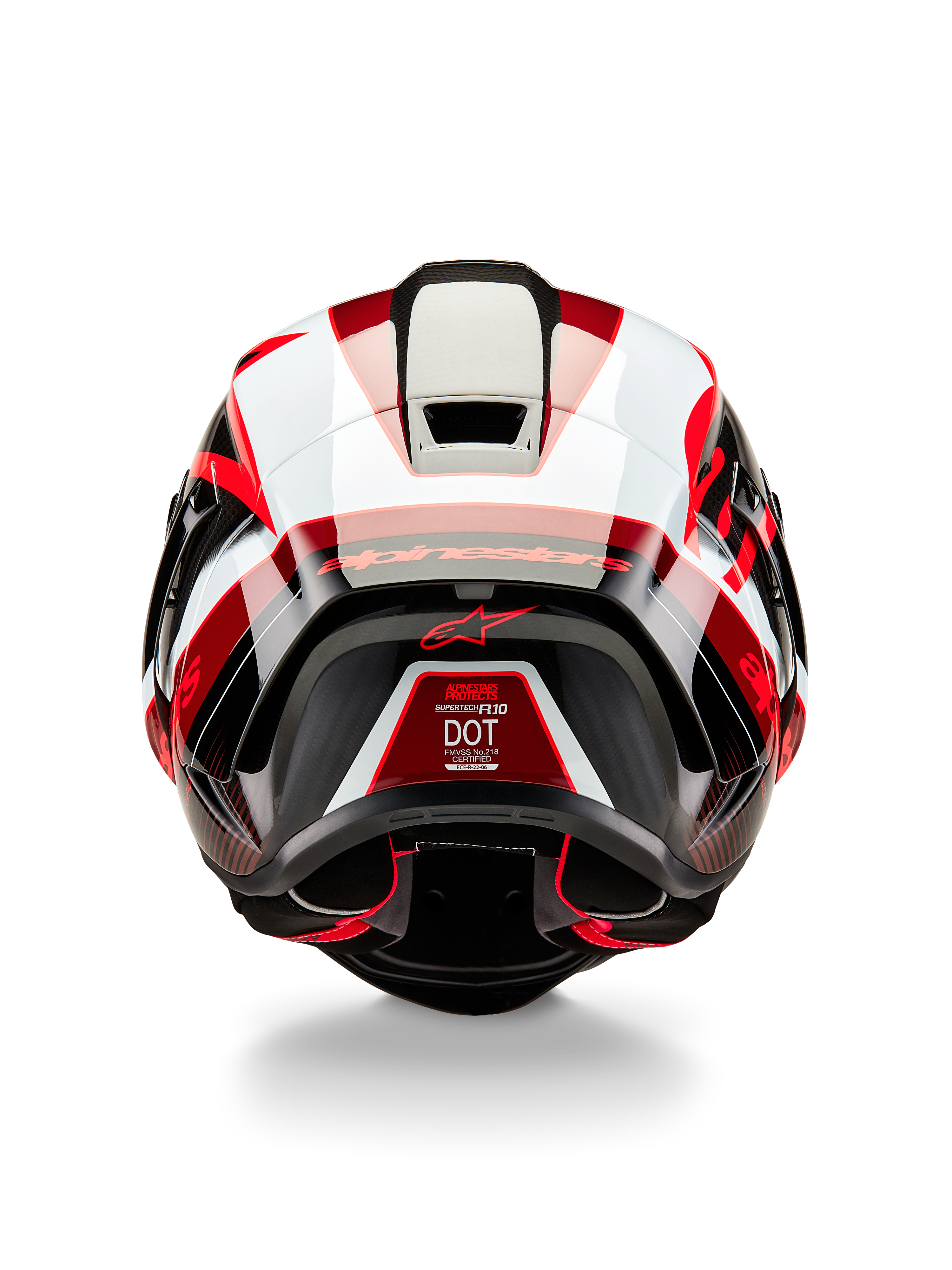 Kask Alpinestars Supertech R10 Team, widok z tyłu, czarny karbon, czerwony i biały połysk, aerodynamiczny design skorupy z wyrazistymi czerwonymi i białymi panelami, branding Alpinestars na spojlerze i czerwone logo gwiazdy, profesjonalny wyścigowy kask motocyklowy