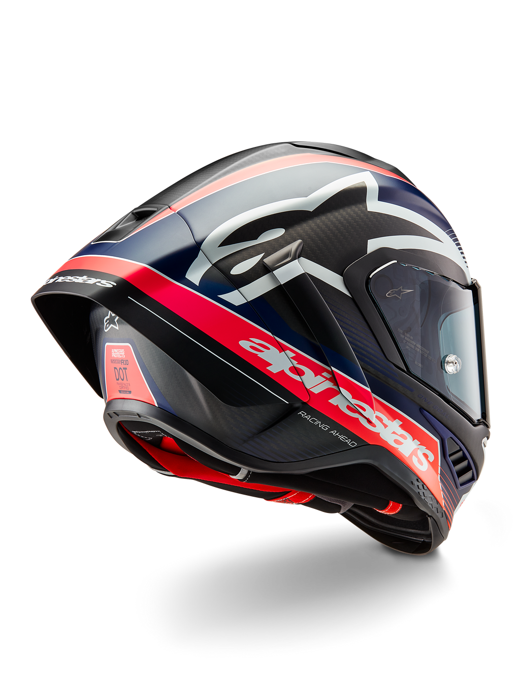 Kask Alpinestars Supertech R10 Team, profesjonalny kask motocyklowy wyścigowy, czarny karbon z fluorescencyjnymi czerwonymi i matowymi niebieskimi akcentami, aerodynamiczny widok z tyłu pokazujący zintegrowany spojler, wyraźne logo Alpinestars oraz widoczną teksturę skorupy z włókna węglowego.
