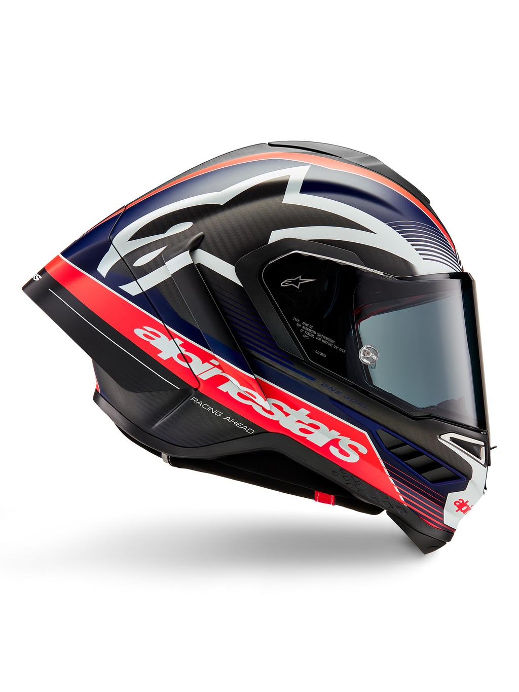Kask Alpinestars Supertech R10 Team, kask motocyklowy wyścigowy, czarny karbon z akcentami w kolorze czerwonym fluo i matowym niebieskim, duże białe logo Alpinestars, aerodynamiczny design ze zintegrowanymi spojlerami, przezroczysty wizjer, widoczna tekstura włókna węglowego, smukły profil wyścigowy