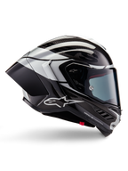 Kask Alpinestars Supertech R10 Element, integralny kask wyścigowy, wykończenie Black Carbon, srebrne i czarne z połyskiem, widok z boku z aerodynamiczną skorupą z włókna węglowego, przezroczystym wizjerem i wyraźnym logo Alpinestars