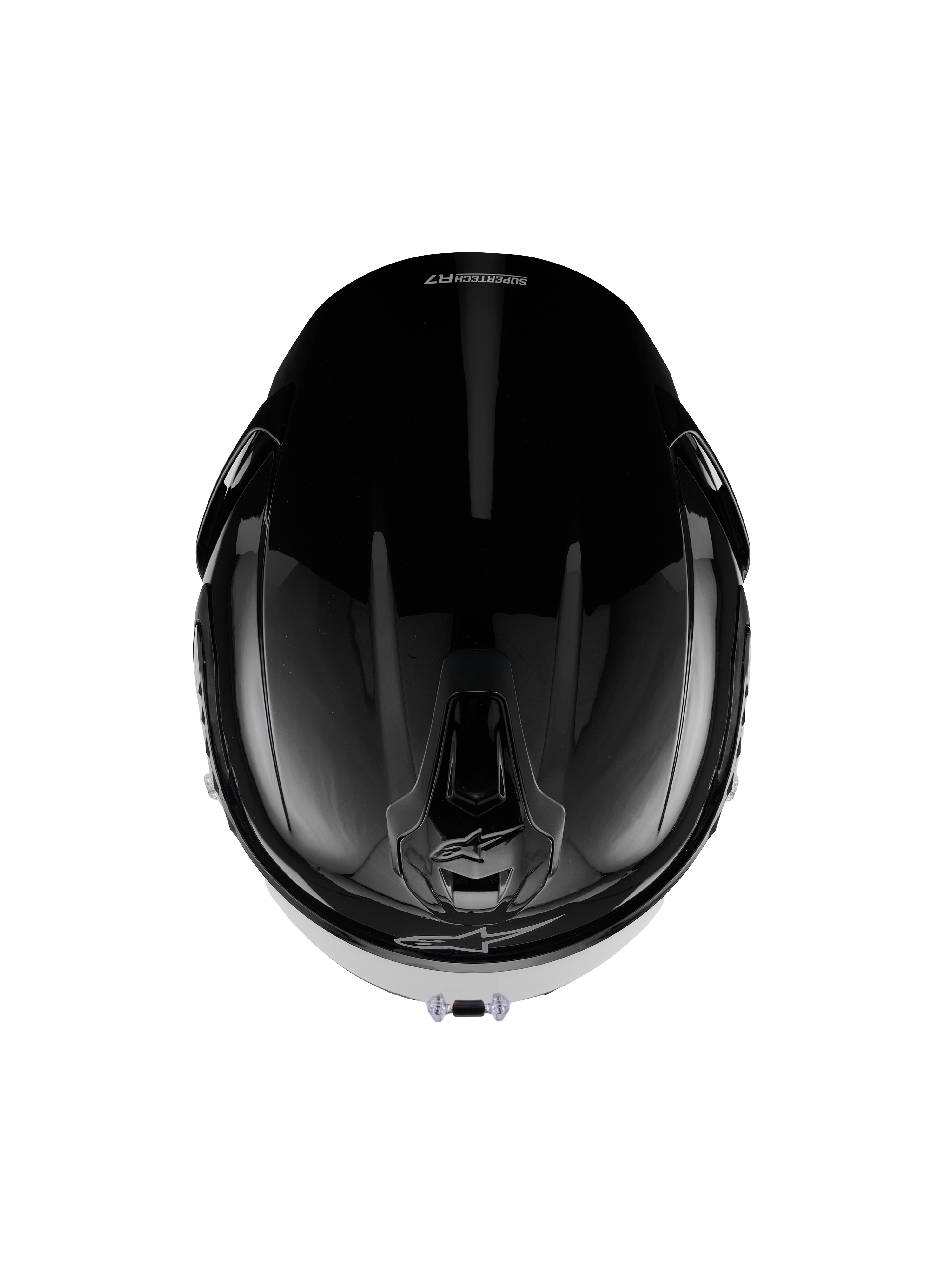 Kask Alpinestars S-R7 Solid, kask motocyklowy integralny, czarny błyszczący, widok z góry prezentujący aerodynamiczną skorupę, otwory wentylacyjne i gładkie błyszczące wykończenie