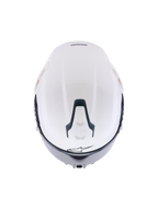 Kask Alpinestars S-R7 Solid, biały błyszczący kask motocyklowy integralny, widok z góry przedstawiający aerodynamiczną skorupę, przesuwny górny wlot wentylacyjny z czarnymi akcentami i charakterystyczne logo gwiazdy, smukły design inspirowany wyścigami zapewniający stabilność przy dużych prędkościach.