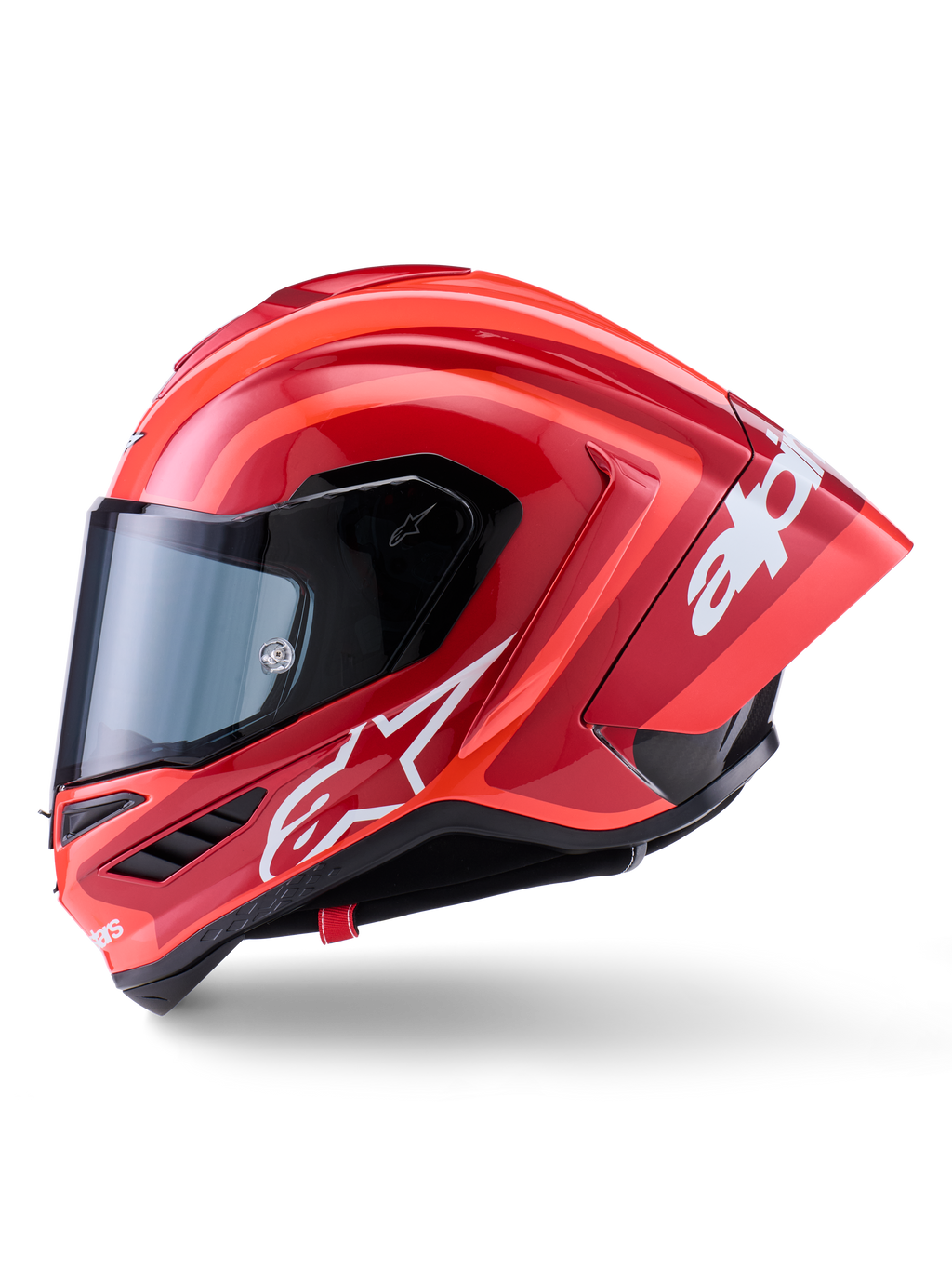 Kask Alpinestars Supertech R10 Arius, wyścigowy kask typu full-face, błyszczący czerwony z białymi grafikami logo, widok z boku podkreślający aerodynamiczny spojler i przezroczysty wizjer, skorupa z kompozytu włókna węglowego do profesjonalnych sportów motorowych