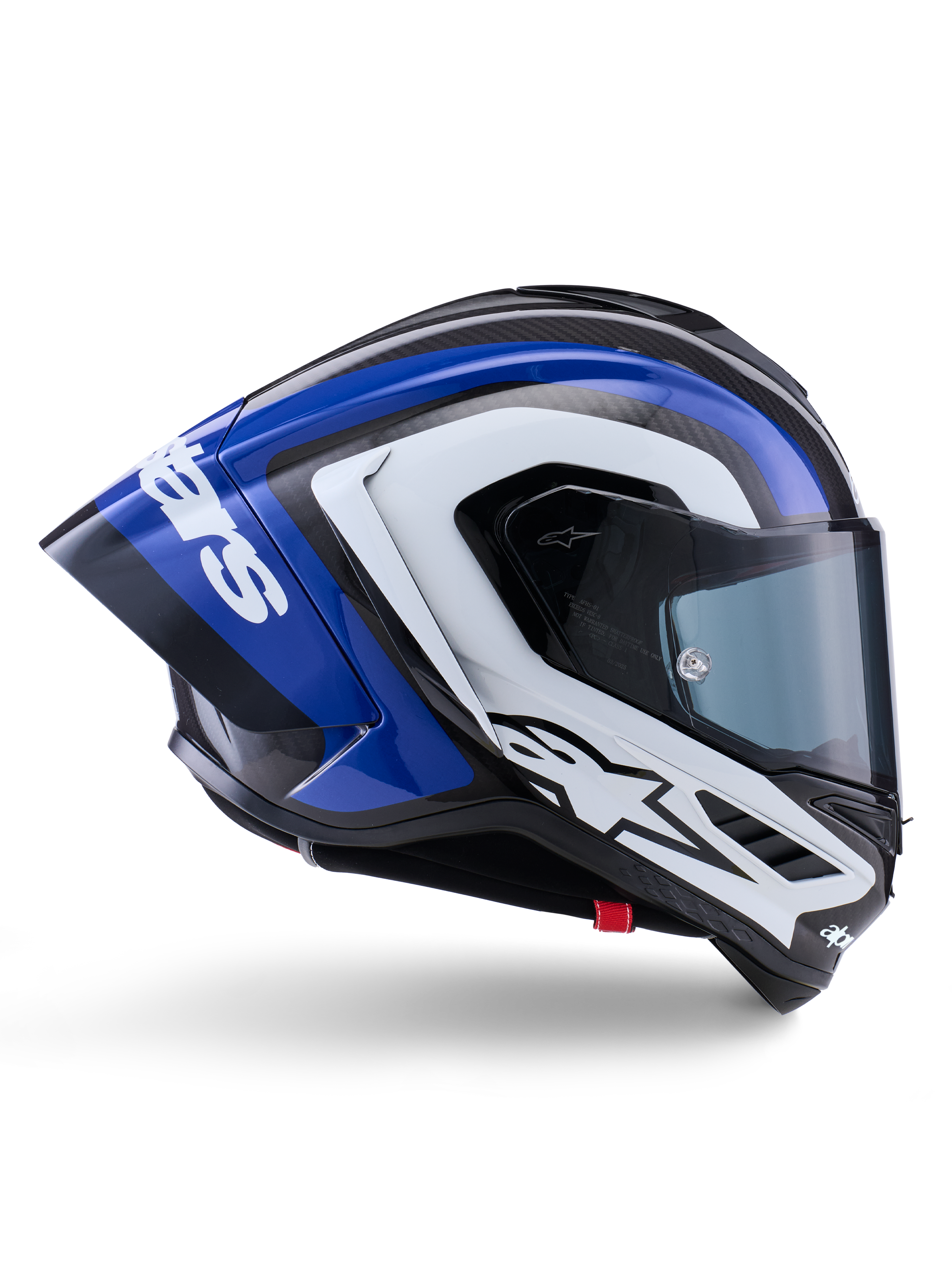 Kask Alpinestars Supertech R10 Arius, pełny kask wyścigowy, błyszczące wykończenie w kolorach czarnym, białym i niebieskim, aerodynamiczny widok z boku ukazujący skorupę z włókna węglowego i duży tylny spojler z logo Alpinestars, profesjonalny motocyklowy sprzęt ochronny