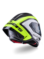 Kask Alpinestars Supertech R10 Arius, widok z tyłu, czarno-srebrny i żółty neonowy z połyskiem, konstrukcja skorupy z włókna węglowego, duży aerodynamiczny spojler z czarnym napisem Alpinestars, ochrona klasy wyścigowej, smukły design
