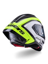Kask Alpinestars Supertech R10 Arius, widok z tyłu, czarno-srebrny i żółty neonowy z połyskiem, konstrukcja skorupy z włókna węglowego, duży aerodynamiczny spojler z czarnym napisem Alpinestars, ochrona klasy wyścigowej, smukły design