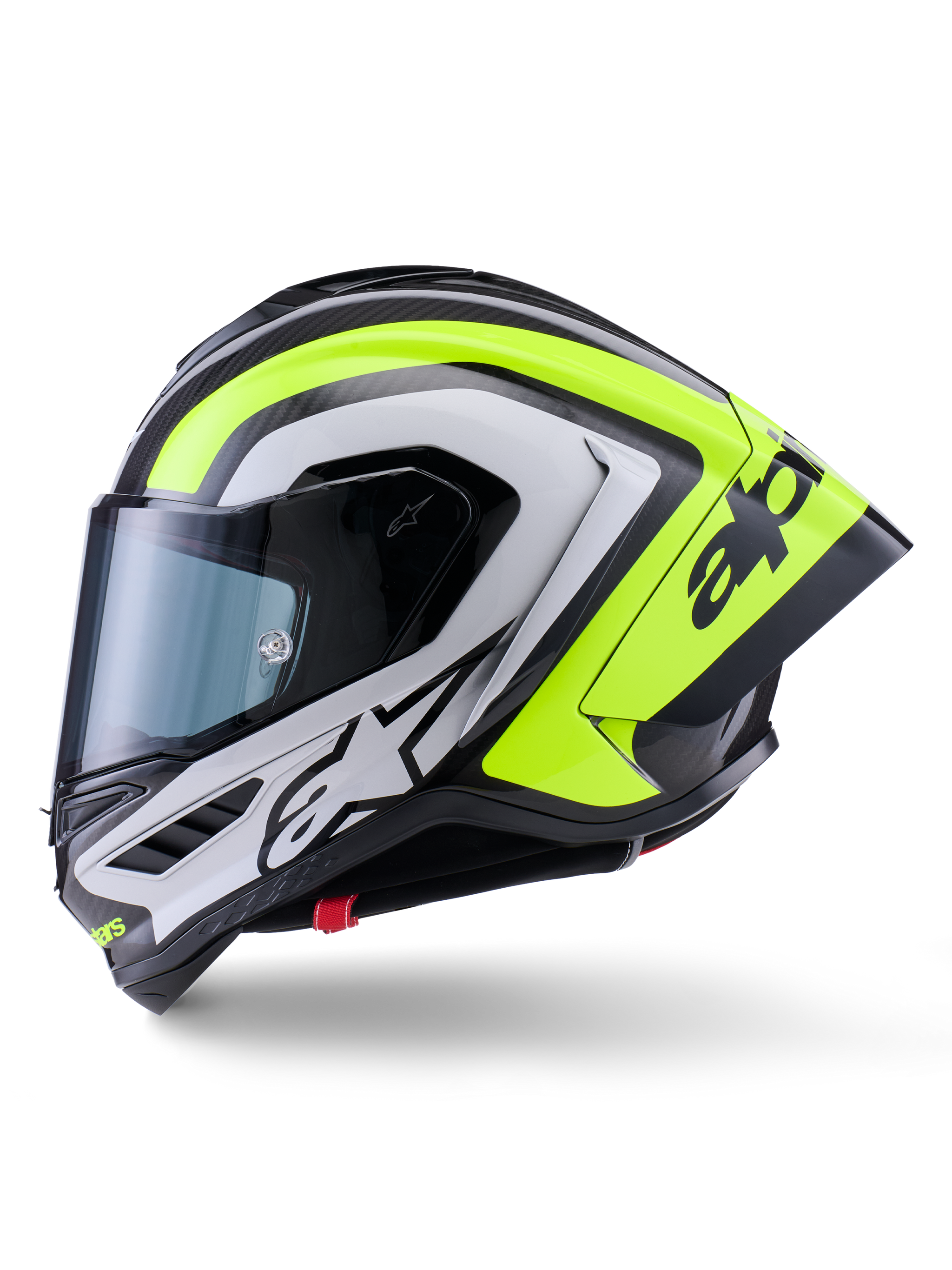 Kask Alpinestars Supertech R10 Arius, wyścigowy kask motocyklowy, czarny, srebrny i żółty fluo z połyskiem, widok z boku, wyposażony w aerodynamiczny tylny spojler, konstrukcję z włókna węglowego, wyraziste oznaczenia marki i przyciemniany wizjer.