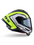 Alpinestars Supertech R10 Arius Helmet, kask wyścigowy typu full-face, czarny, srebrny i żółty fluo z połyskiem, widok z profilu prezentujący aerodynamiczną skorupę i ciemny dymiony wizjer, konstrukcja z włókna węglowego z wyrazistym brandingiem