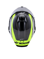 Kask Alpinestars Supertech R10 Arius, widok z góry, czarno-srebrny i żółty fluorescencyjny w połysku, skorupa z włókna węglowego z jaskrawymi żółtymi pasami, aerodynamiczne górne otwory wentylacyjne, branding Alpinestars, wysokiej klasy kask wyścigowy