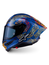 Kask Supertech R10 Martinator Thai, niebieska skorupa z włókna węglowego, złote i czerwone wzory mandali, styl wyścigowy.