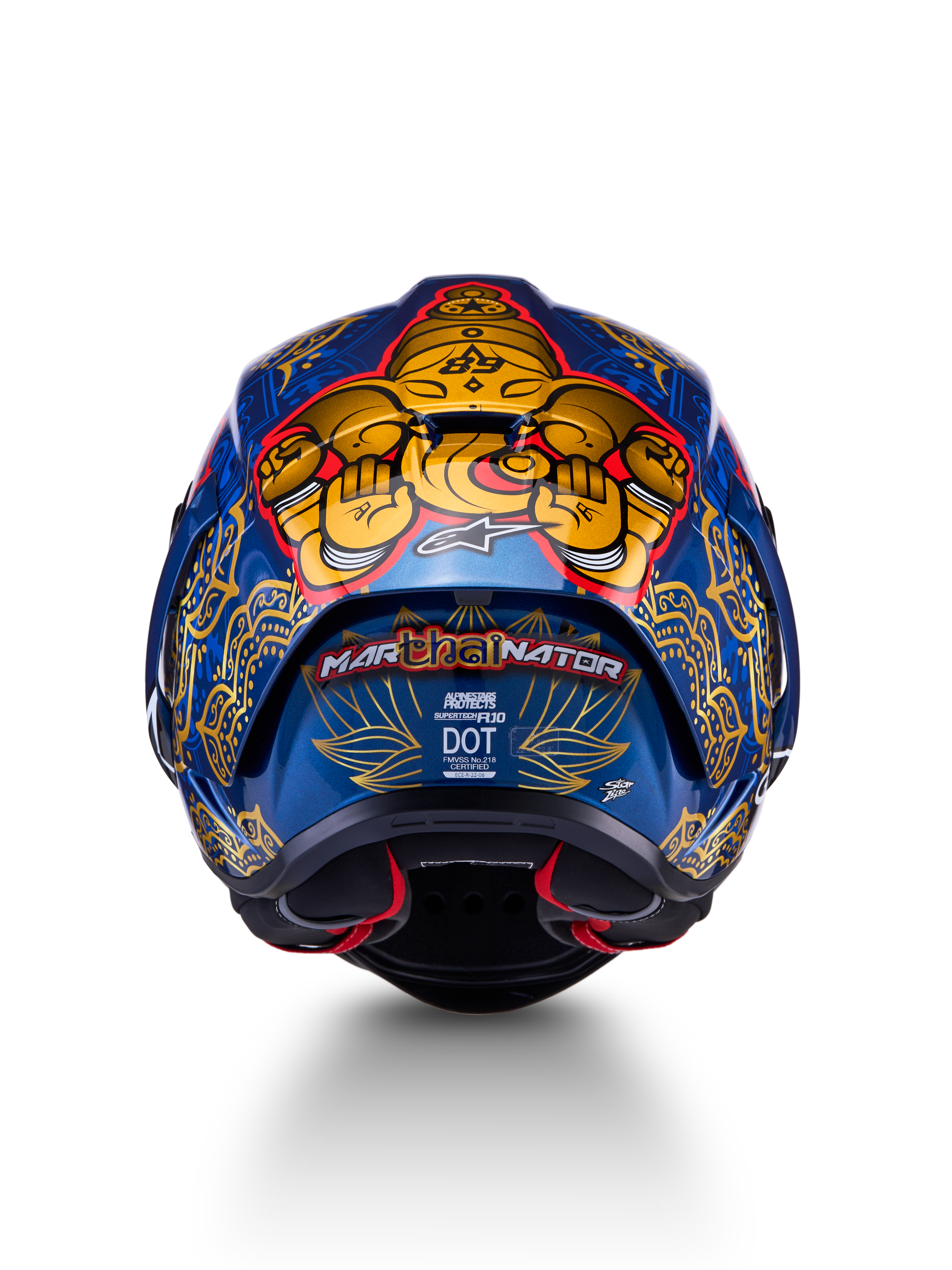 Kask Supertech R10 Martinator Thai, widok z tyłu na błyszczącą niebieską skorupę z włókna węglowego ze złotymi zdobieniami.