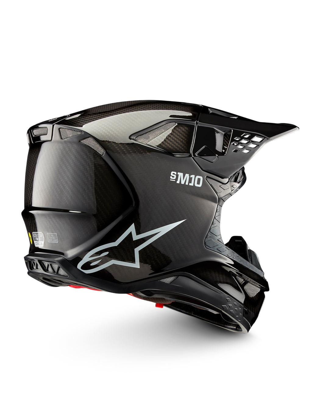 Alpinestars Supertech M10 Solid ECE 22.06, czarny błyszczący kask motocrossowy z włókna węglowego, widok z boku z otworami wentylacyjnymi i daszkiem, certyfikowany ECE 22.06
