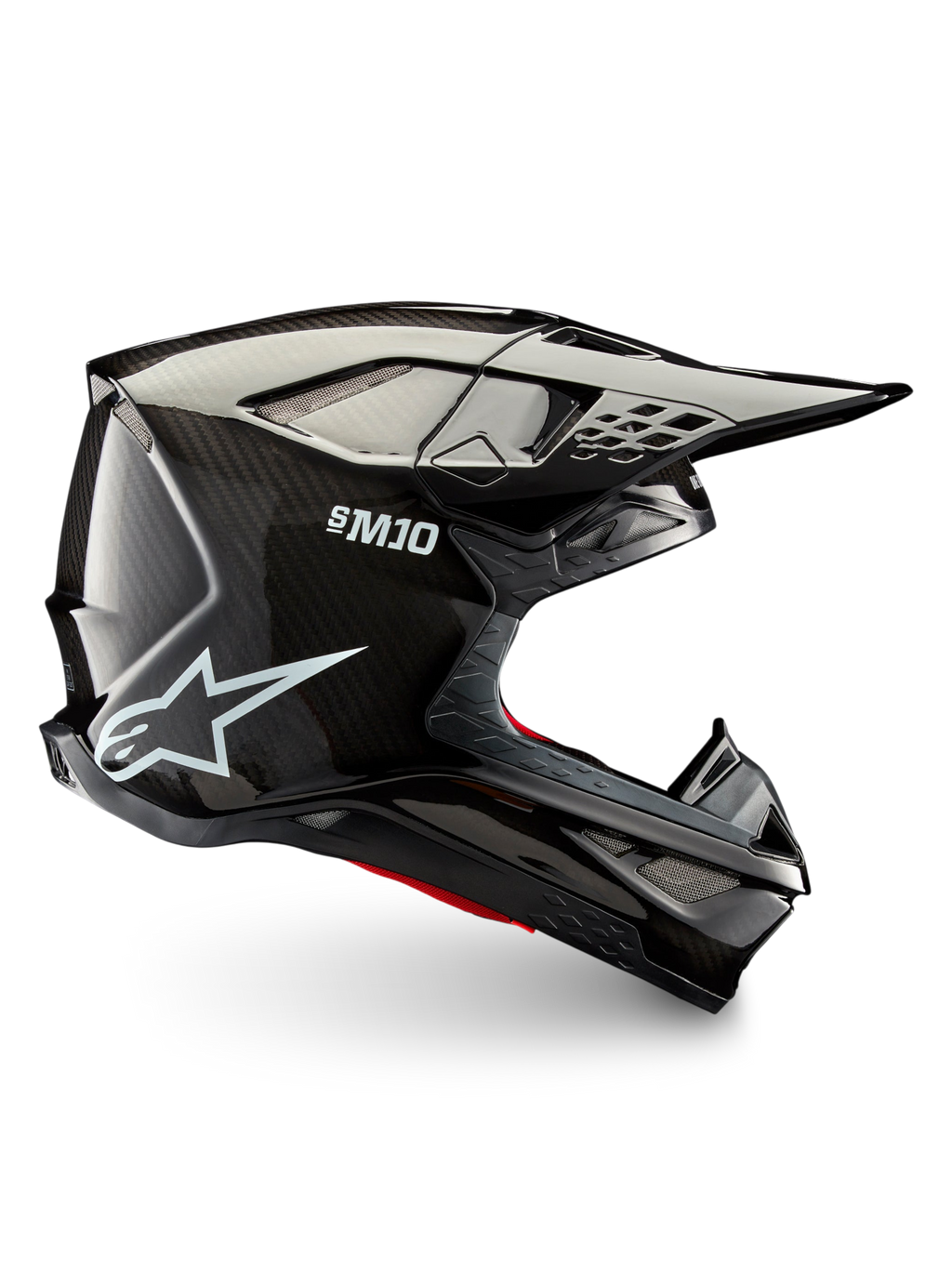 Alpinestars Supertech M10 Solid, czarny błyszczący kask motocrossowy z karbonową skorupą, daszkiem i otworami wentylacyjnymi, widok z boku do jazdy terenowej